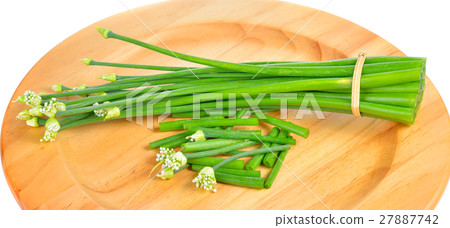 Onion flower on wooden tray 27887742