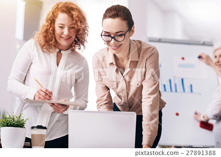 Delighted involved colleagues collaborating in the Delighted involved colleagues collaborating in the 27891388