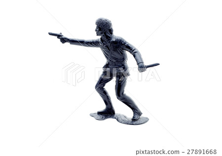 Miniature toy cowboy figurine isolated on white. Miniature toy cowboy figurine isolated on white. 27891668