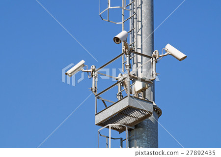 security camera and urban video at pole  blue sky 27892435