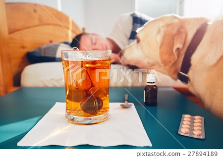 Sick man in bed 27894189