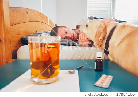 Sick man in bed Sick man in bed 27894190
