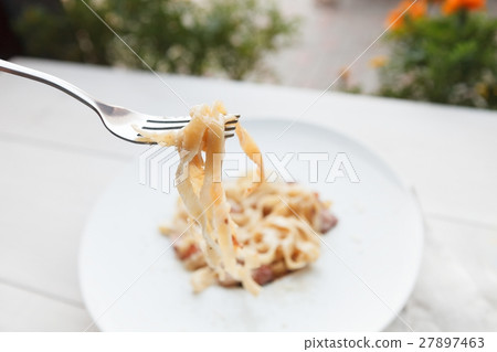 Traditional italian pasta carbonara with bacon and Traditional italian pasta carbonara with bacon and 27897463