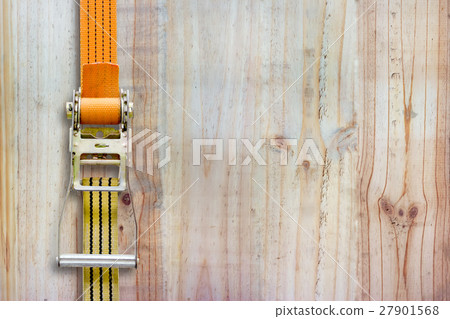 ratchet strap on wood background ratchet strap on wood background 27901568