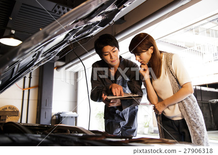 Garage mechanic mechanic Maintenance inspection vehicle Car repair shop garage female driver driver Garage mechanic mechanic Maintenance inspection vehicle Car repair shop garage female driver driver 27906318