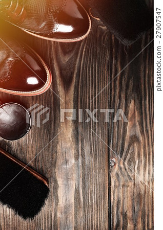 leather shoes on table with polishing equipment leather shoes on table with polishing equipment 27907547