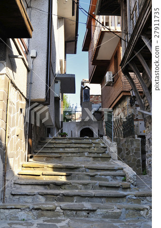 Street of the old town of Nesebar in Bulgaria with steps leading up 27911735