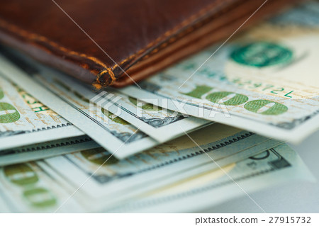 Brown leather wallet with USA dollars money Brown leather wallet with USA dollars money 27915732