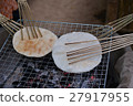 hin slices of rice flour crisped over an open fire 27917955