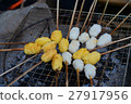hin slices of rice flour crisped over an open fire 27917956