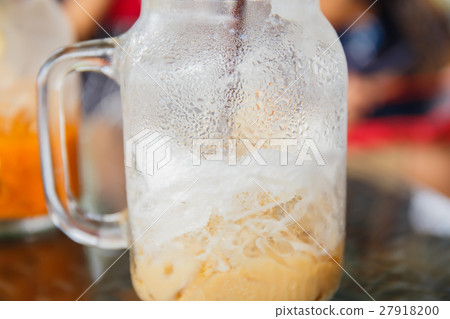 ice tea with milk in glass ice tea with milk in glass 27918200