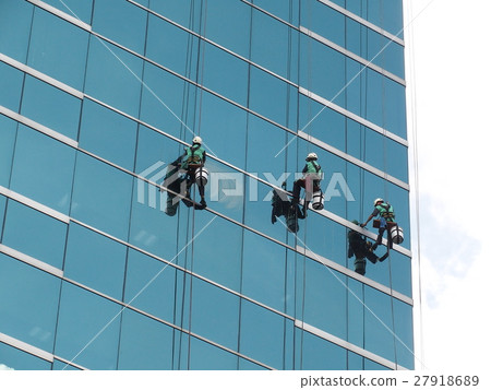 men cleaning glass building men cleaning glass building 27918689