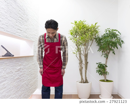 Male staff who bow at the entrance of the office Male staff who bow at the entrance of the office 27921123