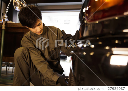 Garage mechanic mechanic Maintenance inspection vehicle Car repair shop garage Garage mechanic mechanic Maintenance inspection vehicle Car repair shop garage 27924087