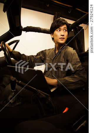 Garage mechanic mechanic male maintenance inspection vehicle car repair shop 27924124