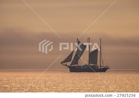 A sailing ship on the Baltic Sea in sunset light 27925256