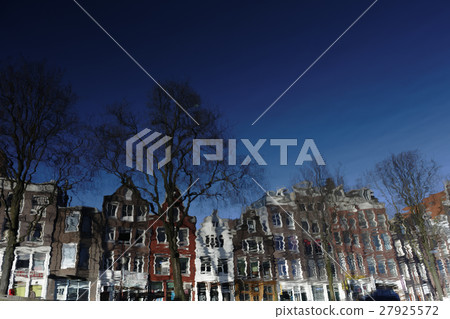 Water reflection of buildings in Amsterdam, Netherlands 27925572