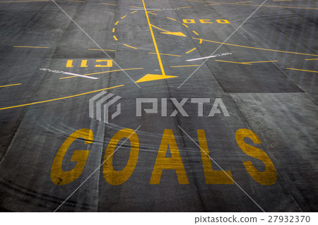 goals words on the surface of the airport runway 27932370