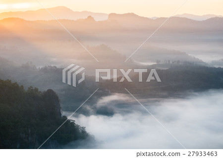 Scenic landscape on foggy hill at sunrise 27933463
