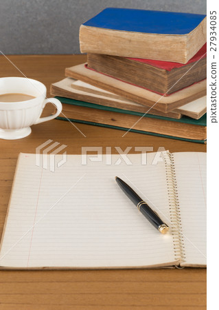 old notebook with pen on wood table old notebook with pen on wood table 27934085