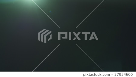 green lens flare artifacts over black background 27934600