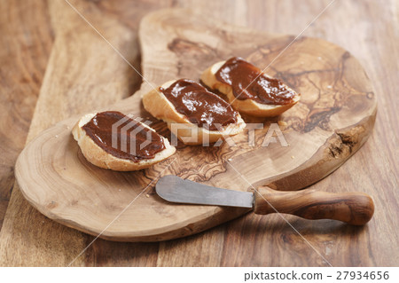 baguette slices with homemade hazelnut cream baguette slices with homemade hazelnut cream 27934656