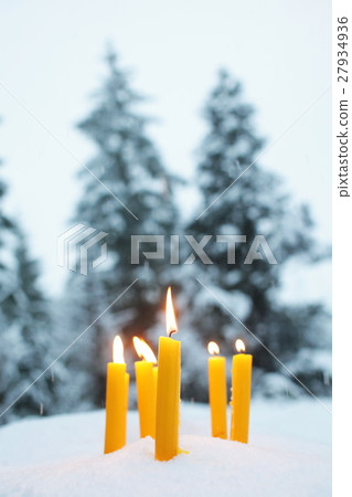 Yellow Candles In Snow 27934936