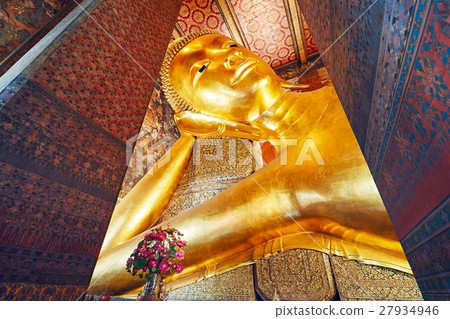 Golden statue of the Reclining Buddha Golden statue of the Reclining Buddha 27934946