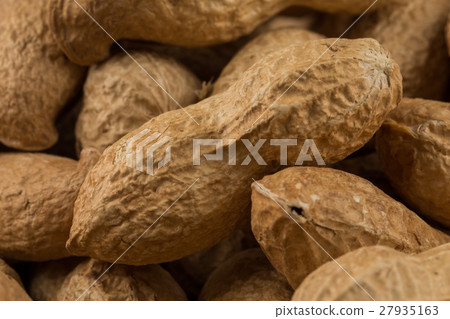 Pile of peanuts shells close up 27935163