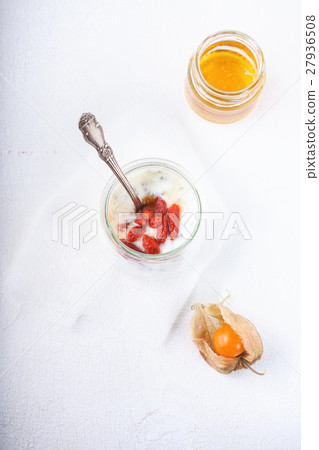 Yoghurt with goji berries, chia seeds and honey Yoghurt with goji berries, chia seeds and honey 27936508