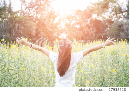 Portrait of happy and enjoying young woman Portrait of happy and enjoying young woman 27938528