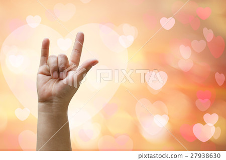 Love hand sign with beautiful background Love hand sign with beautiful background 27938630