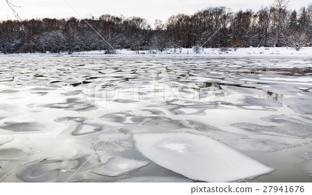 floating ice floes on surface of river in twilight floating ice floes on surface of river in twilight 27941676