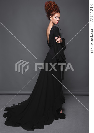 Beautiful girl in evening dress with avant-garde 27945218