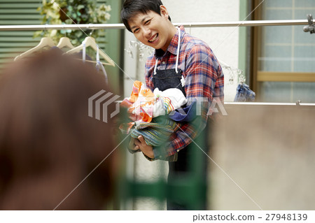 Husband's housekeeper greeting neighbors 27948139