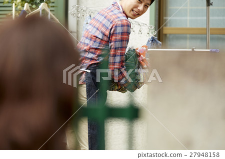 Husband's housekeeper greeting neighbors 27948158