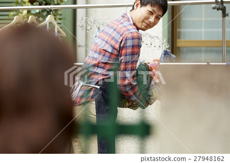 Husband's housekeeper greeting neighbors 27948162