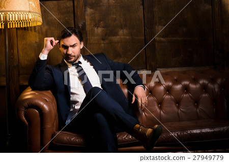 Rich businessman with cigar Rich businessman with cigar 27949779