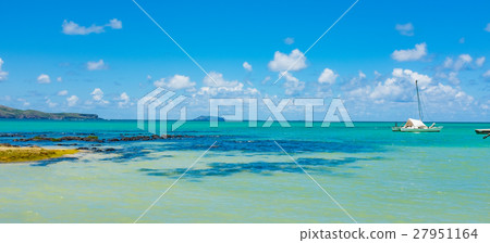 Beach on the tropical island. Clear blue water Beach on the tropical island. Clear blue water 27951164