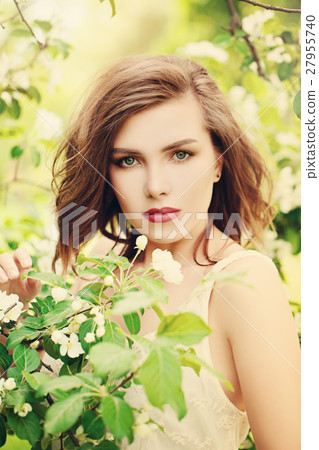 Cute Girl in Spring Park. Fashion Model Woman Cute Girl in Spring Park. Fashion Model Woman 27955740