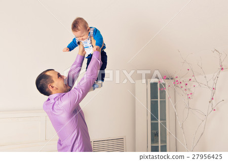 Happy family father and baby child son playing 27956425