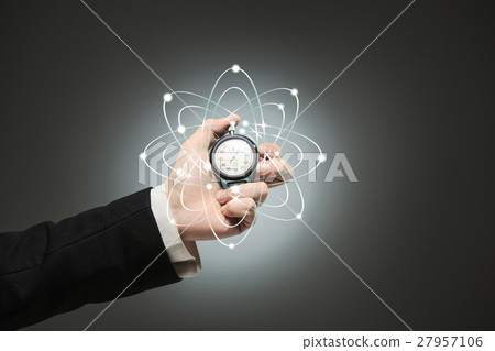 hand holding a stopwatch against white background hand holding a stopwatch against white background 27957106