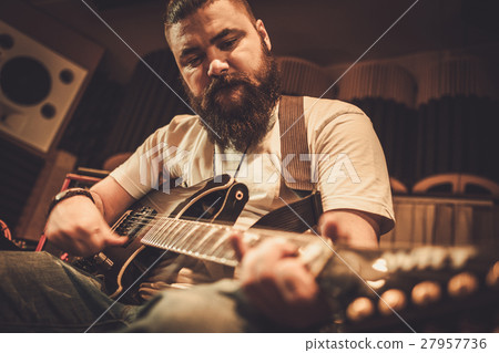 Professional guitarists performing in boutique Professional guitarists performing in boutique 27957736