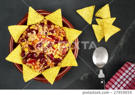 Vegetarian chili con carne with tortilla chips. Vegetarian chili con carne with tortilla chips. 27959059