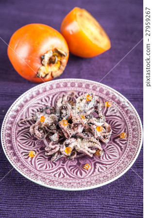 Small octopuses decorated with red caviar 27959267