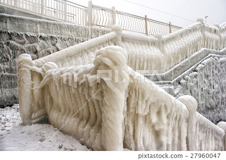 ice covered staircase on the beach 27960047