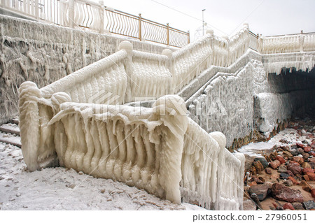 ice covered staircase on the beach 27960051