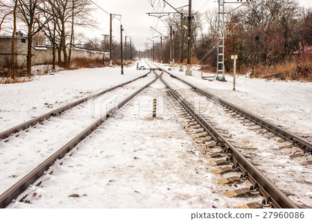 railway receding into the distance in the winter 27960086