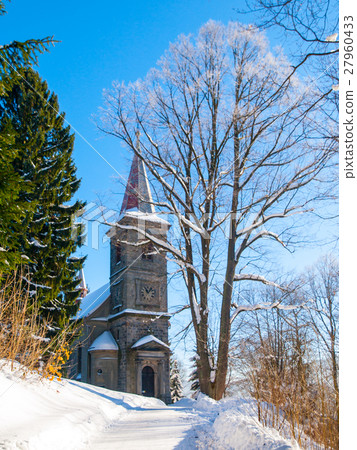 Rural church in winter time, Horni Tanvald 27960433