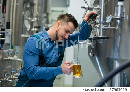 Brewer testing beer 27963619